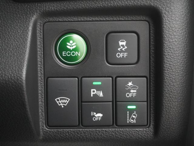 ヴェゼル ハイブリッドZ・ホンダセンシング インターナビシートヒーターLEDオートライトサイドエアバッグサイドカーテンエアバッグアダプティブクルーズコントロールレーンキープアシストルーフレール レーダーサポート Pセンサー DVD再生機能(24枚目)