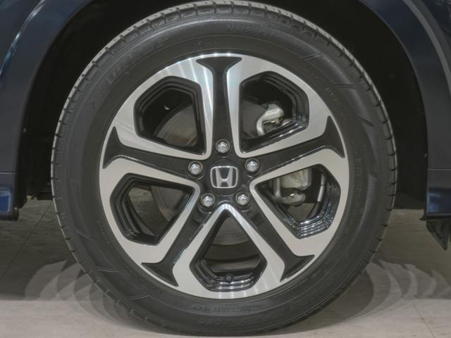 ヴェゼル ハイブリッドZ・ホンダセンシング インターナビシートヒーターLEDオートライトサイドエアバッグサイドカーテンエアバッグアダプティブクルーズコントロールレーンキープアシストルーフレール レーダーサポート Pセンサー DVD再生機能(28枚目)