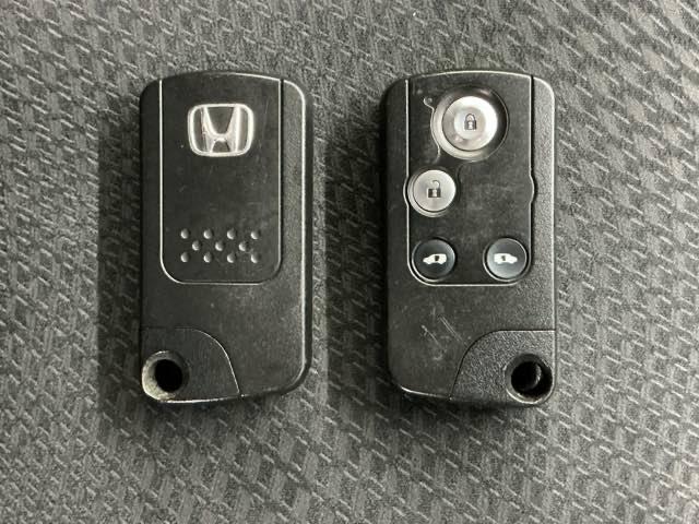 ステップワゴンスパーダ Zクールスピリット ホンダ認定中古車 純正ナビ 両側電動 バックカメ キーフリー ナビTV 横滑防止 DVD視聴可能 フルオートエアコン パワーウインドウ Aクルーズ USB入力 三列シート 運転席エアバック パワステ(17枚目)