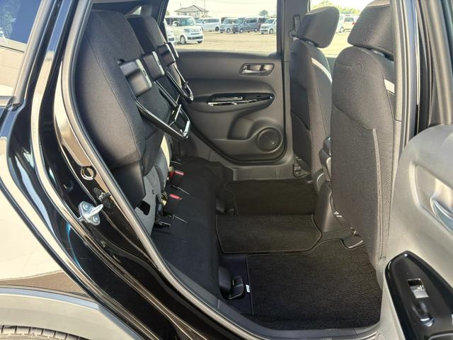 フィット ｅ：ＨＥＶクロスター　１オーナー・センシング純正ナビＢカメラＥＴＣ（64枚目）