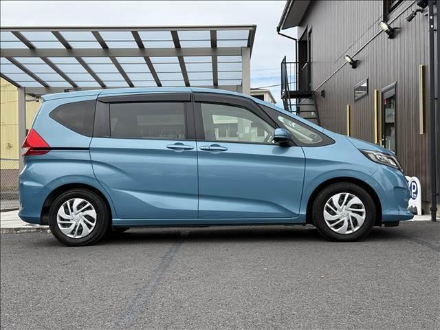 フリード G・ホンダセンシング 9インチフルセグナビ 両電スラ ホンダセンシング Bモニター スマートキー Pスタート ETC BT DVD再生 クルコン ステリモ LEDヘッドライト Aライト Iストップ マット バイザー(7枚目)