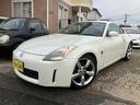 フェアレディZ バージョンT 車検2年付き BOSEサウンドシステム Z33後期純正アルミ ナビ CD DVD ETC バックモニター レザーシート シートヒーター パワーシート キーレス MTモード付5AT 2シーター(7枚目)