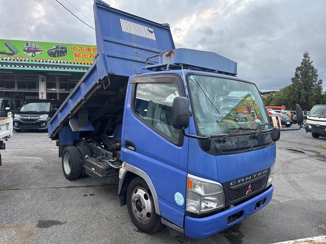 キャンター ダンプ　ＭＴ　後輪ダブル　電動格納ミラー　エアコン　パワーウィンドウ　運転席エアバッグ　記録簿（6枚目）