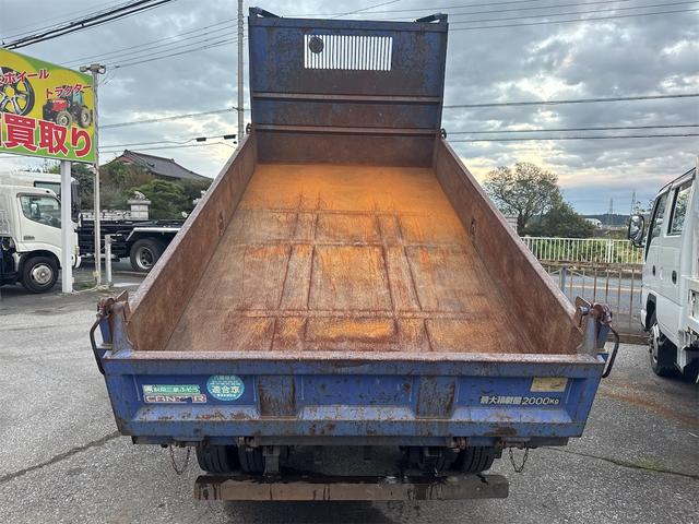 キャンター ダンプ　ＭＴ　後輪ダブル　電動格納ミラー　エアコン　パワーウィンドウ　運転席エアバッグ　記録簿（11枚目）