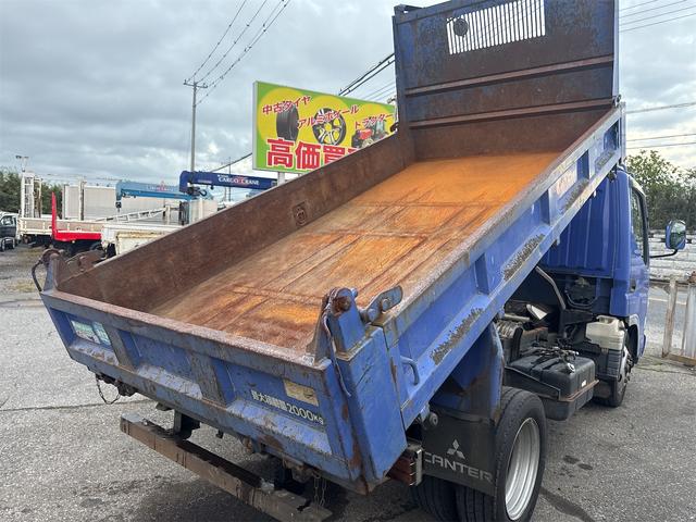 キャンター ダンプ　ＭＴ　後輪ダブル　電動格納ミラー　エアコン　パワーウィンドウ　運転席エアバッグ　記録簿（14枚目）