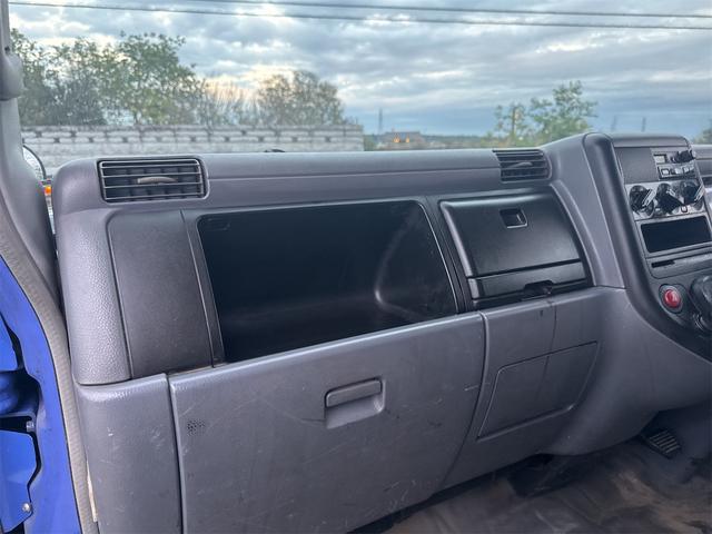 キャンター ダンプ　ＭＴ　後輪ダブル　電動格納ミラー　エアコン　パワーウィンドウ　運転席エアバッグ　記録簿（34枚目）