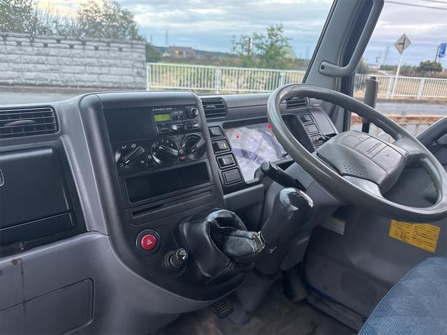 キャンター ダンプ　ＭＴ　後輪ダブル　電動格納ミラー　エアコン　パワーウィンドウ　運転席エアバッグ　記録簿（35枚目）