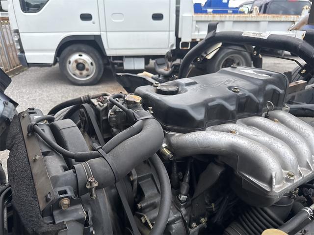 キャンター ダンプ　ＭＴ　後輪ダブル　電動格納ミラー　エアコン　パワーウィンドウ　運転席エアバッグ　記録簿（59枚目）
