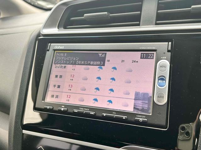 フィット １３Ｇ・Ｆパッケージ　ＥＴＣ　バックカメラ　ナビ　ＴＶ　アルミホイール　スマートキー　アイドリングストップ　ＣＶＴ　盗難防止システム　衝突安全ボディ　ＡＢＳ　ＥＳＣ　ＣＤ　ＤＶＤ再生　ＵＳＢ　Ｂｌｕｅｔｏｏｔｈ　エアコン（13枚目）