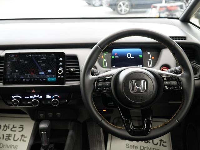 フィット ｅ：ＨＥＶＲＳ　当社デモカー９インチコネクトディスプレイ誤発進抑制機能後方誤発進抑制機能渋滞追従機能付きＡＣＣＬＥＤオートライトオートハイビームパーキングセンサーレーンキープアシストサイドエアバッグ　ナビ＆ＴＶ　禁煙（15枚目）