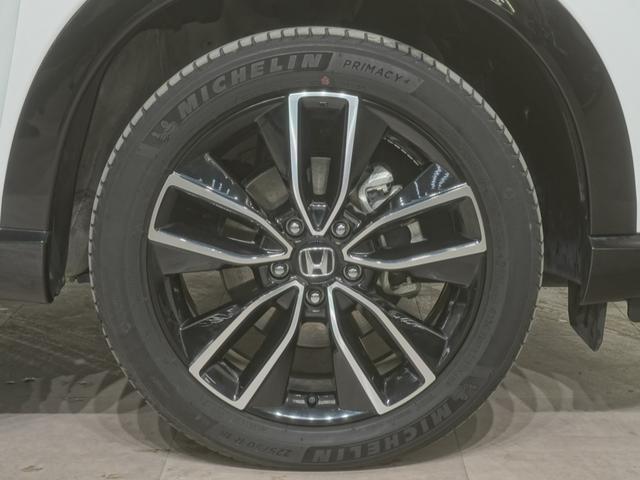 ヴェゼル ｅ：ＨＥＶＺ　ワンオーナー　９インチインターナビ　シートヒーター　ステアリングヒーター　パワーテールゲート　ブラインドスポットインフォメーション　渋滞追従機能付きＡＣＣ　レーンキープアシスト　誤発進抑制機能　ＥＴＣ（30枚目）