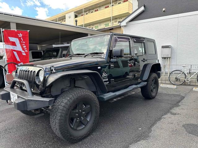 ジープ・ラングラーアンリミテッド スポーツ 4WD リフトアップ 社外オバーフェンダー ドライブレコーダー ETC バックカメラ フロントカメラ オートクルーズ ナビ アルミホイール キーレスエントリー AT 盗難防止システム CD DVD再生(11枚目)