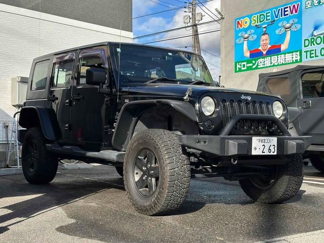 ジープ・ラングラーアンリミテッド スポーツ 4WD リフトアップ 社外オバーフェンダー ドライブレコーダー ETC バックカメラ フロントカメラ オートクルーズ ナビ アルミホイール キーレスエントリー AT 盗難防止システム CD DVD再生(13枚目)