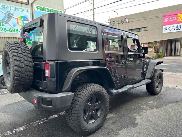 ジープ・ラングラーアンリミテッド スポーツ 4WD リフトアップ 社外オバーフェンダー ドライブレコーダー ETC バックカメラ フロントカメラ オートクルーズ ナビ アルミホイール キーレスエントリー AT 盗難防止システム CD DVD再生(15枚目)