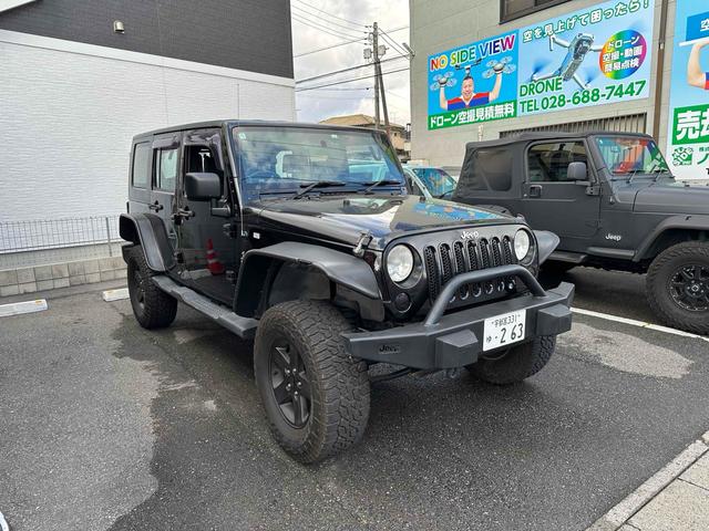 ジープ・ラングラーアンリミテッド スポーツ 4WD リフトアップ 社外オバーフェンダー ドライブレコーダー ETC バックカメラ フロントカメラ オートクルーズ ナビ アルミホイール キーレスエントリー AT 盗難防止システム CD DVD再生(21枚目)