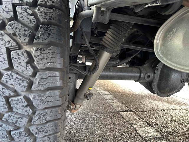 ジープ・ラングラーアンリミテッド スポーツ 4WD リフトアップ 社外オバーフェンダー ドライブレコーダー ETC バックカメラ フロントカメラ オートクルーズ ナビ アルミホイール キーレスエントリー AT 盗難防止システム CD DVD再生(27枚目)