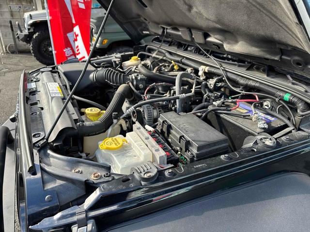 ジープ・ラングラーアンリミテッド スポーツ 4WD リフトアップ 社外オバーフェンダー ドライブレコーダー ETC バックカメラ フロントカメラ オートクルーズ ナビ アルミホイール キーレスエントリー AT 盗難防止システム CD DVD再生(40枚目)