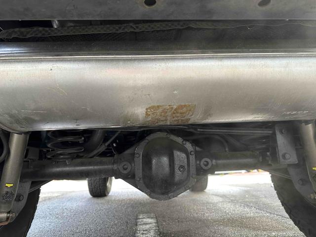 ジープ・ラングラーアンリミテッド スポーツ 4WD リフトアップ 社外オバーフェンダー ドライブレコーダー ETC バックカメラ フロントカメラ オートクルーズ ナビ アルミホイール キーレスエントリー AT 盗難防止システム CD DVD再生(52枚目)