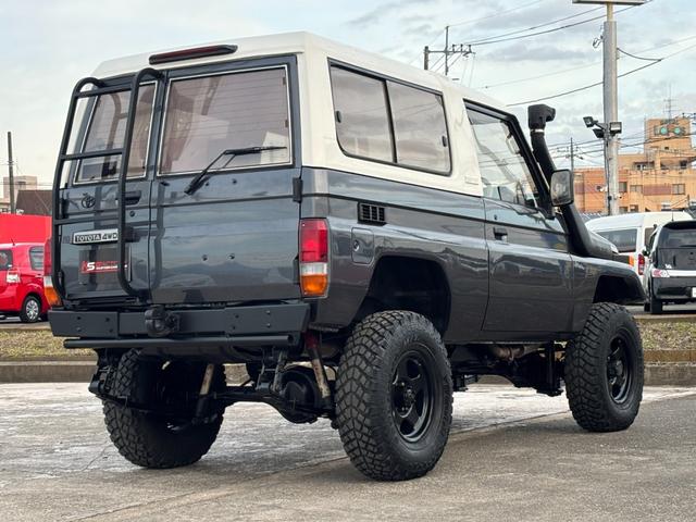 ランドクルーザー７０ ＺＸ　ランクル７０／ランクル７３／ディーゼル／４速ＡＴ／ＺＸ／ＦＲＰトップ／シュノーケル／社外１６ＡＷ／ジオランダーＭＴタイヤ（２５５／８５Ｒ１６）／リフトアップ／ショートボディー／社外ステアリング（67枚目）