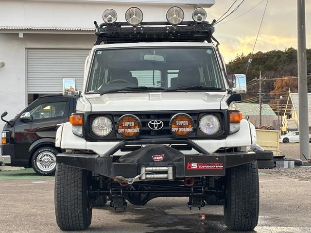 ランドクルーザー70 LX ランクル70/ランクル77/ディーゼル/5速MT/前後デフロック/LX/リフトアップ/社外ルーフラック/リアラダー/SUPER OFF ROADERフォグランプ/ウィンチ/ETC/シートカバー(8枚目)