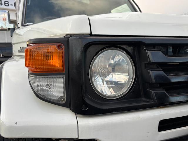 ランドクルーザー70 LX ランクル70/ランクル77/ディーゼル/5速MT/前後デフロック/LX/リフトアップ/社外ルーフラック/リアラダー/SUPER OFF ROADERフォグランプ/ウィンチ/ETC/シートカバー(48枚目)