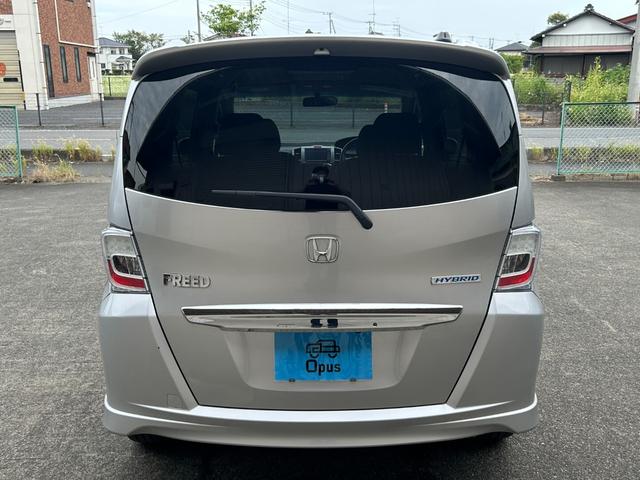 フリードハイブリッド ジャストセレクション　純正インターナビ　スマートキー　バックカメラ　ＨＩＤ　パワースライドドア　ＥＴＣ　ＤＶＤ再生　ワンセグＴＶ　ミュージックサーバー　クルーズコントロール　ドアバイザー（32枚目）