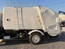 全塗装仕上げ済み 塵芥車/パッカー車 極東開発工業製 GB50-83D-S 巻き込み式/回転板式 ダンプ排出式 容積5.0立米 連続スイッチ 汚水タンク ターボ 積載2t 5速MT(10枚目)
