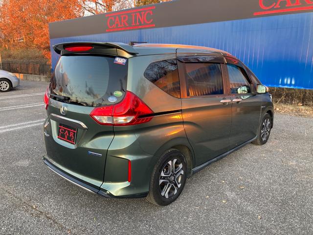 フリード+ハイブリッド ハイブリッド・クロスターホンダセンシング 両側パワースライドドア ギャザズナビ ホンダセンシング レーダークルーズコントロール ハーフレザーシート ETC(14枚目)