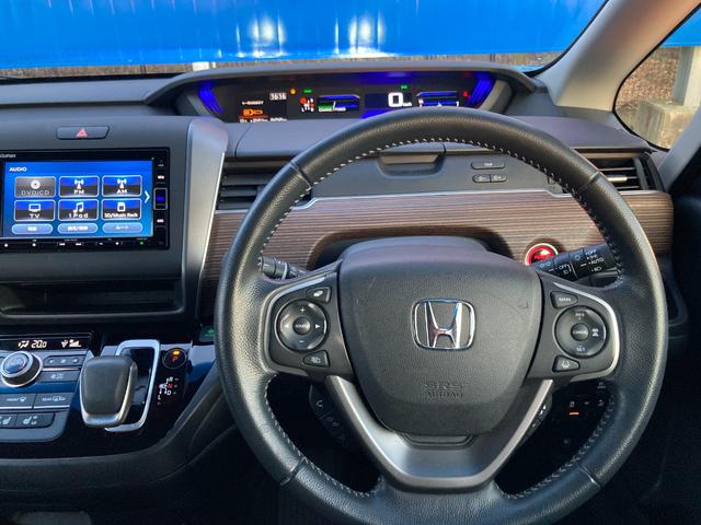 フリード+ハイブリッド ハイブリッド・クロスターホンダセンシング 両側パワースライドドア ギャザズナビ ホンダセンシング レーダークルーズコントロール ハーフレザーシート ETC(33枚目)