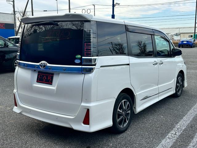 ヴォクシー ＺＳ　煌ＩＩ　両側パワースライドドア　フロントモデリスタエアロ　ＳＤナビ　Ｂｌｕｅｔｏｏｔｈオーディオ　フルセグＴＶ　ステアリングスイッチ　バックカメラ　フリップダウンモニター　パーキングアシスト　ＥＴＣ（11枚目）