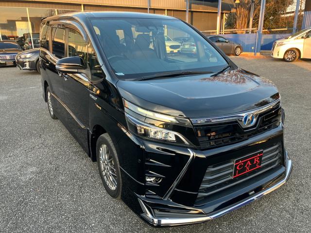 ヴォクシー ハイブリッドＺＳ　両側パワースライドドア　トヨタセーフティセンス　オートクルーズコントロール　純正ナビ　フリップダウンモニター　Ｂｌｕｅｔｏｏｔｈオーディオ　フルセグＴＶ　ステアリングスイッチ　バックカメラ　ＥＴＣ（3枚目）