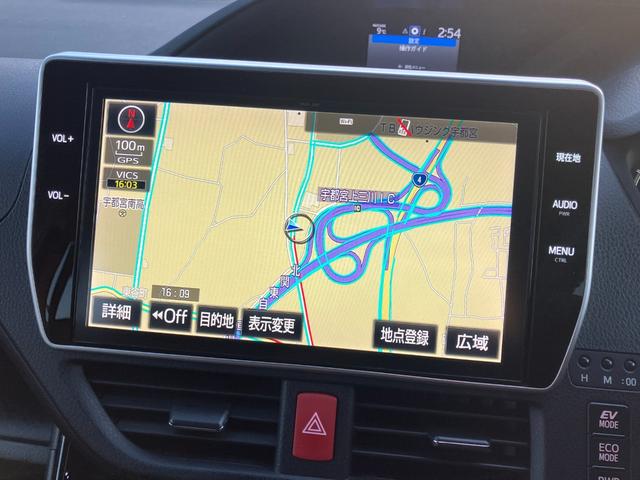 ヴォクシー ハイブリッドＺＳ　両側パワースライドドア　トヨタセーフティセンス　オートクルーズコントロール　純正ナビ　フリップダウンモニター　Ｂｌｕｅｔｏｏｔｈオーディオ　フルセグＴＶ　ステアリングスイッチ　バックカメラ　ＥＴＣ（32枚目）