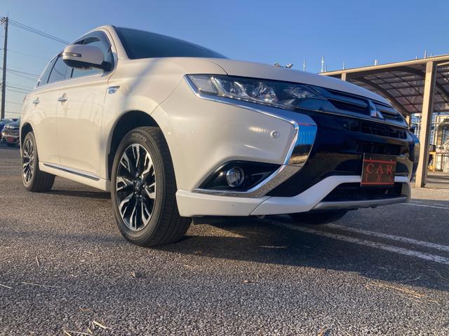 アウトランダーＰＨＥＶ Ｇプレミアムパッケージ　４ＷＤ　純正ナビ　Ｂｌｕｅｔｏｏｔｈオーディオ　フルセグＴＶ　アラウンドビューモニター　フリップダウン　クリアランスソナー　ブラインドスポット　革シート　ＬＥＤヘッドライト　パワーシート　ＥＴＣ（54枚目）