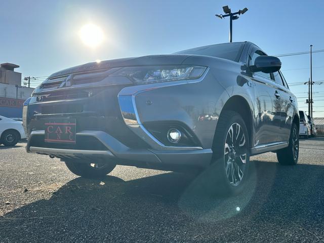 アウトランダーPHEV Gナビパッケージ 4WD サンルーフ アクティブクルーズコントロール 純正SDナビ Bluetoothオーディオ 全方位カメラ ステアリングスイッチ クリアランスソナー ブラインドスポット パワーバックドア(56枚目)