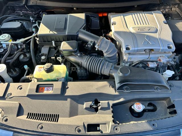 アウトランダーPHEV Gナビパッケージ 4WD サンルーフ アクティブクルーズコントロール 純正SDナビ Bluetoothオーディオ 全方位カメラ ステアリングスイッチ クリアランスソナー ブラインドスポット パワーバックドア(64枚目)