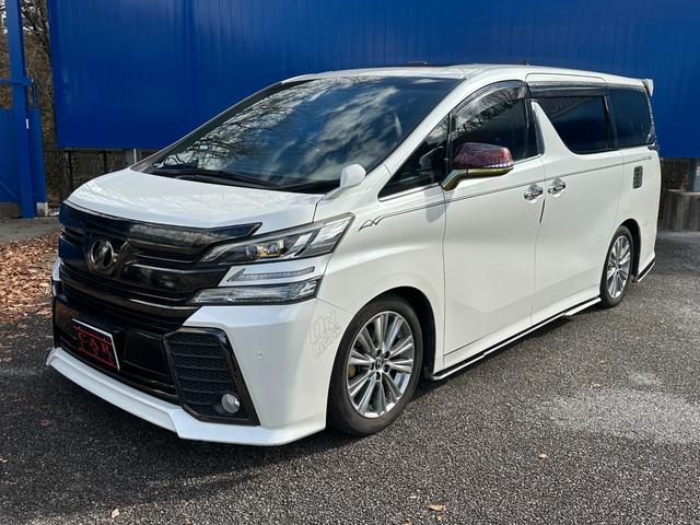 ヴェルファイア ２．５Ｚ　Ａエディション　ゴールデンアイズ　サンルーフ　後席モニター　純正１０型ナビ　社外エアサス　社外エアロ　バックカメラ　フルセグＴＶ　両側電動スライドドア　電動リアゲート　１００Ｖ電源　クルコン　シートカバー　ＬＥＤヘッドライト（14枚目）