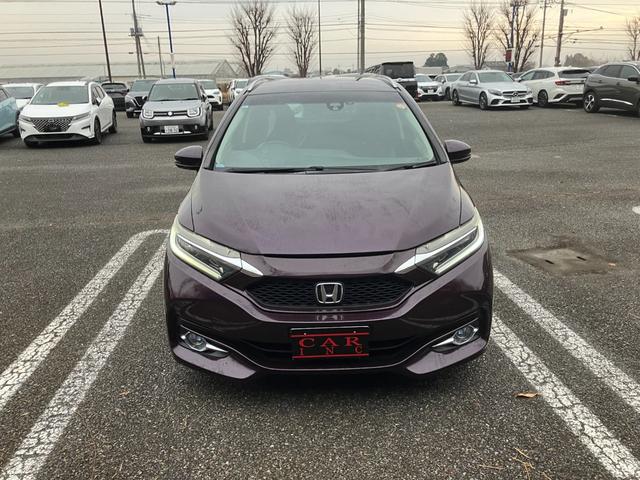 シャトル ハイブリッドＺ　純正ナビ　Ｂｌｕｅｔｏｏｔｈオーディオ　バックカメラ　ステアリングスイッチ　ハーフレザーシート　前席シートヒーター　純正１６インチアルミホイール　ＥＴＣ（2枚目）