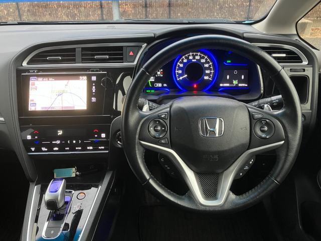 シャトル ハイブリッドＺ　純正ナビ　Ｂｌｕｅｔｏｏｔｈオーディオ　バックカメラ　ステアリングスイッチ　ハーフレザーシート　前席シートヒーター　純正１６インチアルミホイール　ＥＴＣ（21枚目）