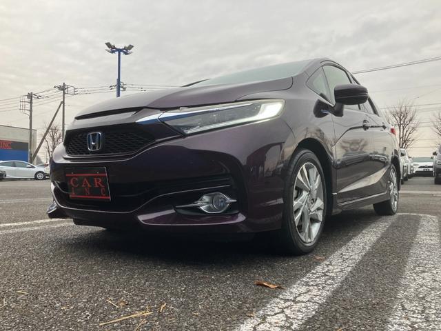 シャトル ハイブリッドＺ　純正ナビ　Ｂｌｕｅｔｏｏｔｈオーディオ　バックカメラ　ステアリングスイッチ　ハーフレザーシート　前席シートヒーター　純正１６インチアルミホイール　ＥＴＣ（31枚目）