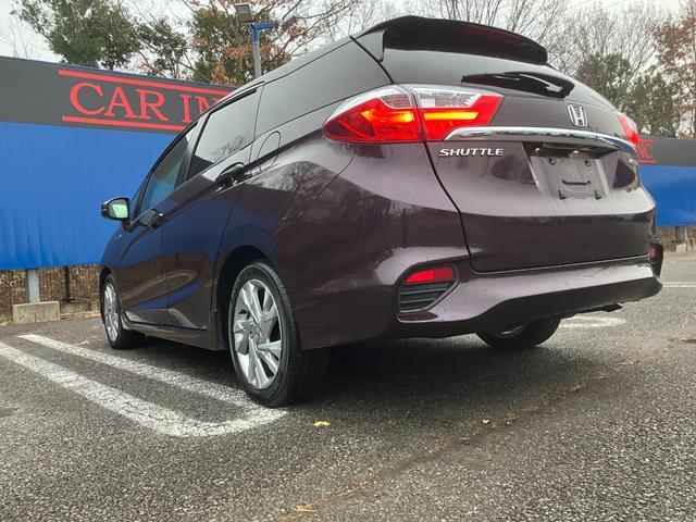 シャトル ハイブリッドＺ　純正ナビ　Ｂｌｕｅｔｏｏｔｈオーディオ　バックカメラ　ステアリングスイッチ　ハーフレザーシート　前席シートヒーター　純正１６インチアルミホイール　ＥＴＣ（34枚目）