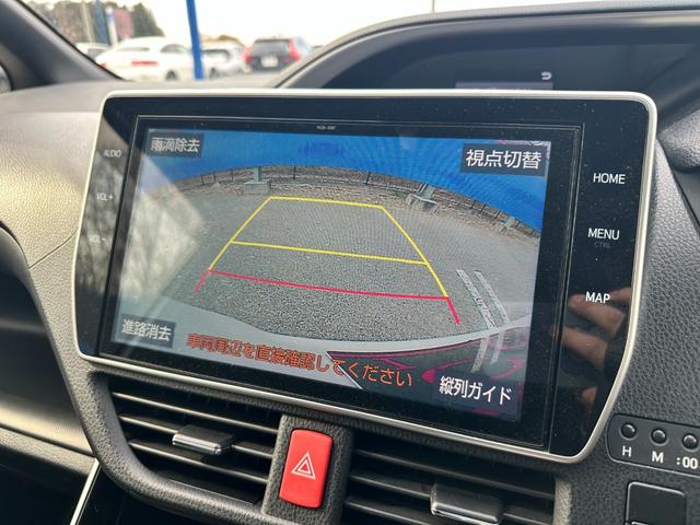 ノア Ｓｉ　ダブルバイビー　両側電動スライドドア　フリップダウンモニター　純正ＳＤナビ　フルセグＴＶ　Ｂｌｕｅｔｏｏｔｈオーディオ　ステアリングスイッチ　バックカメラ　純正１６インチアルミホイール　ＬＥＤヘッドライト　ＥＴＣ（3枚目）