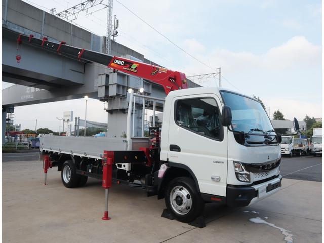 キャンター ２．９ｔ吊６段クレーン　ラジコン付　アルミ平　走行１千ｋｍ　全低床　ワイド超ロング　ユニック　フックイン　ラジコン　リアアウトリガー　アルミブロック　パブコ　３方開　横根太木製　液晶メーターパネル　積載３ｔ　走行１千ｋｍ　車検有　カラーバックカメラ（3枚目）