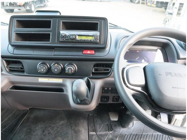 キャンター ２．９ｔ吊６段クレーン　ラジコン付　アルミ平　走行１千ｋｍ　全低床　ワイド超ロング　ユニック　フックイン　ラジコン　リアアウトリガー　アルミブロック　パブコ　３方開　横根太木製　液晶メーターパネル　積載３ｔ　走行１千ｋｍ　車検有　カラーバックカメラ（30枚目）