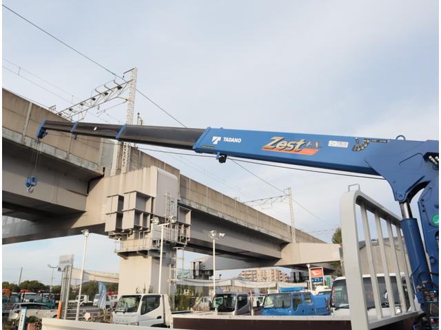 ダイナトラック 2.9t吊4段クレーン 木平 高床 ワイドロング 積載3t 走行23千km タダノ ZX294HSA フックイン ラジコン 警報仕様(定格荷重指示装置付) 3方開 床鉄板貼り 精工ラック 6MT 車検付 電動パーキングブレーキ 社外ナビ(13枚目)