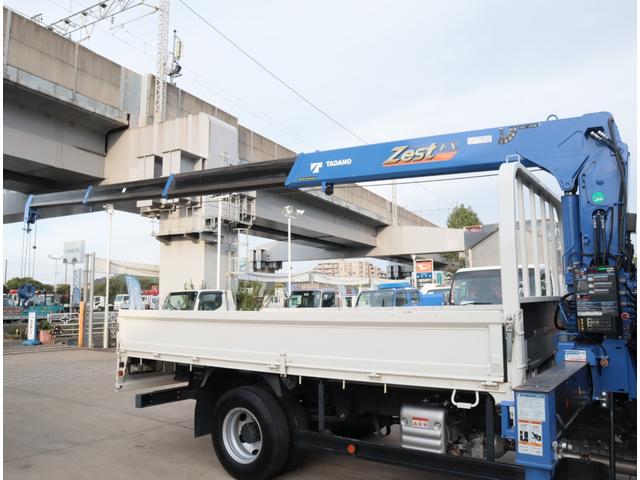 ダイナトラック 2.9t吊4段クレーン 木平 高床 ワイドロング 積載3t 走行23千km タダノ ZX294HSA フックイン ラジコン 警報仕様(定格荷重指示装置付) 3方開 床鉄板貼り 精工ラック 6MT 車検付 電動パーキングブレーキ 社外ナビ(14枚目)