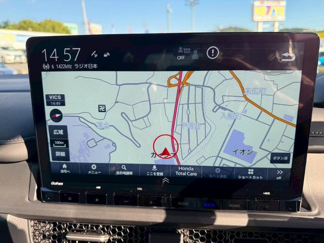ステップワゴン ｅ：ＨＥＶスパーダ　登録済み未使用車　メーカーＯＰデカナビ　アラウンドビュー　フリップダウンモニター　電動リアゲート　シートヒーター　ハーフレザーシート　レーダークルコン　両側自動スライド　コーナーセンサー　オットマン（26枚目）