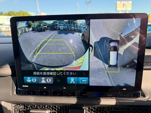 ステップワゴン ｅ：ＨＥＶスパーダ　登録済み未使用車　メーカーＯＰデカナビ　アラウンドビュー　フリップダウンモニター　電動リアゲート　シートヒーター　ハーフレザーシート　レーダークルコン　両側自動スライド　コーナーセンサー　オットマン（27枚目）