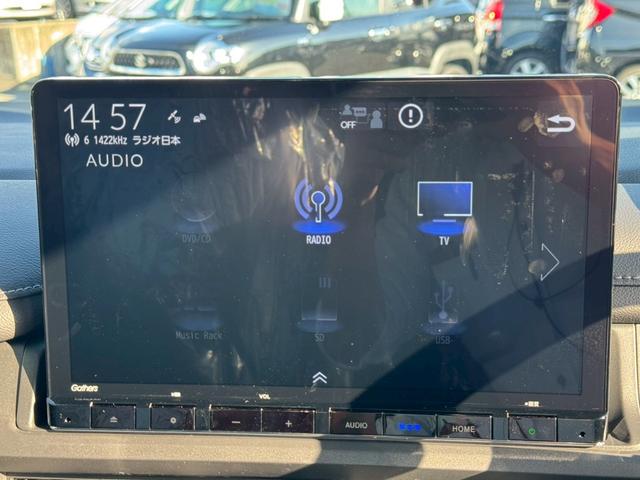 ステップワゴン ｅ：ＨＥＶスパーダ　登録済み未使用車　メーカーＯＰデカナビ　アラウンドビュー　フリップダウンモニター　電動リアゲート　シートヒーター　ハーフレザーシート　レーダークルコン　両側自動スライド　コーナーセンサー　オットマン（28枚目）