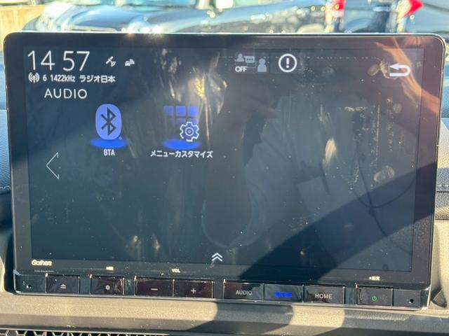 ステップワゴン ｅ：ＨＥＶスパーダ　登録済み未使用車　メーカーＯＰデカナビ　アラウンドビュー　フリップダウンモニター　電動リアゲート　シートヒーター　ハーフレザーシート　レーダークルコン　両側自動スライド　コーナーセンサー　オットマン（29枚目）