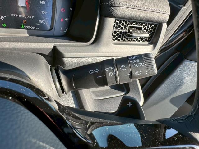 ステップワゴン ｅ：ＨＥＶスパーダ　登録済み未使用車　メーカーＯＰデカナビ　アラウンドビュー　フリップダウンモニター　電動リアゲート　シートヒーター　ハーフレザーシート　レーダークルコン　両側自動スライド　コーナーセンサー　オットマン（32枚目）